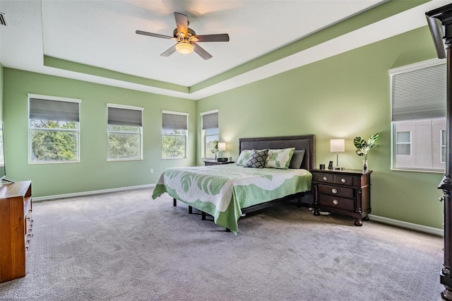 4094 Windcrest Dr, Wesley Chapel, FL 33544 - carpeted bedroom featuring baseboards, a raised ceiling, visible vents, and a ceiling fan