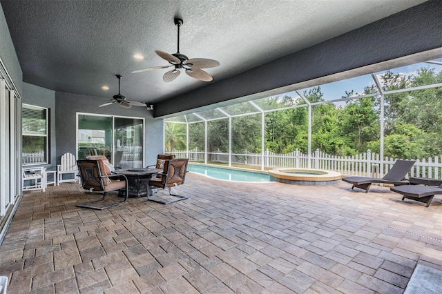 4094 Windcrest Dr, Wesley Chapel, FL 33544 - view of pool with ceiling fan, fence, a patio, and glass enclosure