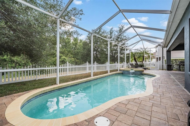 4094 Windcrest Dr, Wesley Chapel, FL 33544 - view of pool featuring a pool with connected hot tub, a patio area, a fenced backyard, and glass enclosure