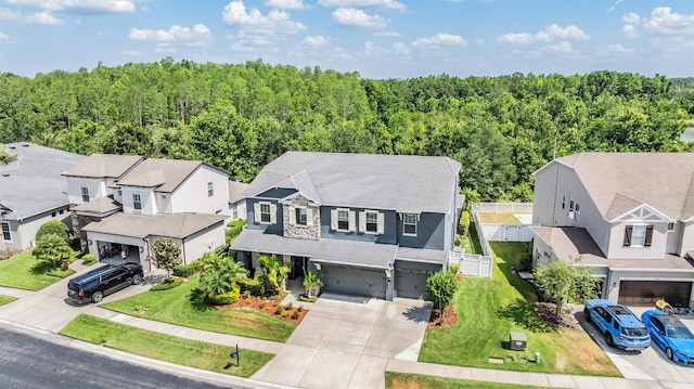 4094 Windcrest Dr, Wesley Chapel, FL 33544 - bird's eye view featuring a forest view and a residential view