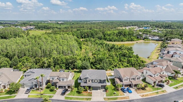 4094 Windcrest Dr, Wesley Chapel, FL 33544 - bird's eye view with a water view, a wooded view, and a residential view