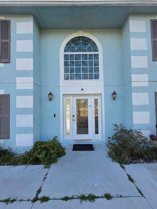 5391 Baldock Ave, Spring Hill, FL 34608 - doorway to property featuring stucco siding