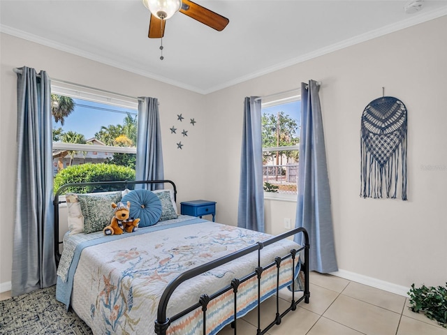 bedroom featuring light tile patterned floors, baseboards, a ceiling fan, and ornamental molding