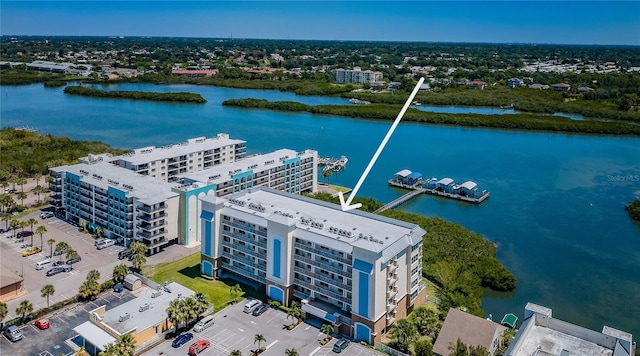 birds eye view of property featuring a water view