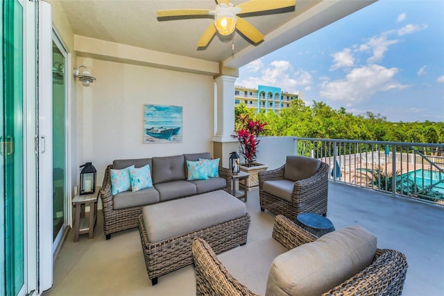 view of patio / terrace featuring a ceiling fan and a balcony