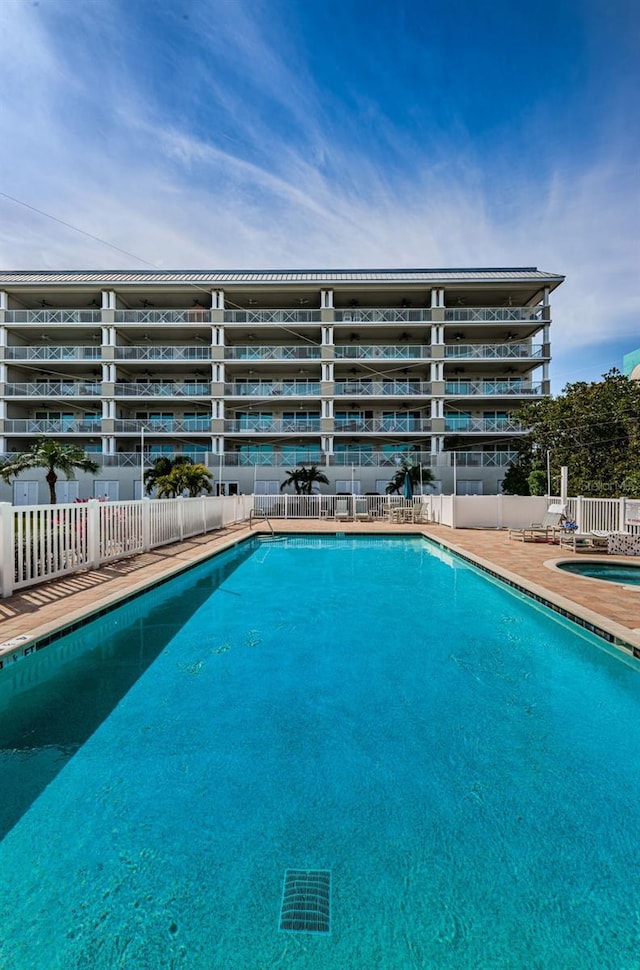 community pool with fence