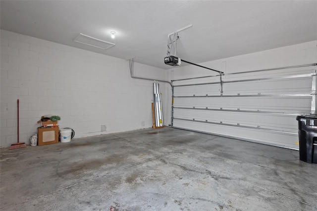 2432 Hearth Dr, Odessa, FL 33556 - garage with a garage door opener and concrete block wall