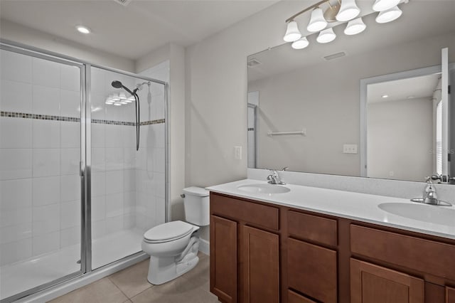 2432 Hearth Dr, Odessa, FL 33556 - full bath featuring a shower stall, tile patterned floors, double vanity, and toilet