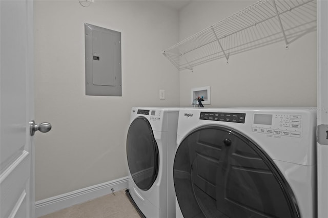 2432 Hearth Dr, Odessa, FL 33556 - clothes washing area with electric panel, separate washer and dryer, baseboards, and light tile patterned floors
