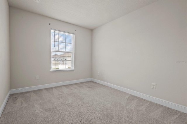 2432 Hearth Dr, Odessa, FL 33556 - carpeted empty room featuring baseboards