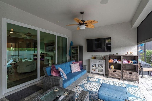 living area featuring ceiling fan