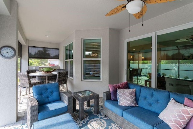 view of patio / terrace featuring a ceiling fan and an outdoor hangout area