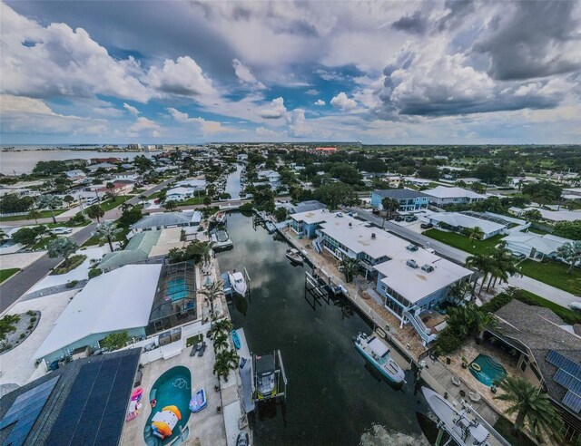 2186 Edythe Dr Unit 11, Dunedin, FL 34698 - aerial perspective of suburban area featuring a large body of water