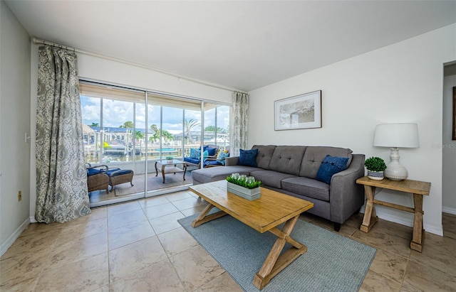 2186 Edythe Dr Unit 11, Dunedin, FL 34698 - living area featuring baseboards