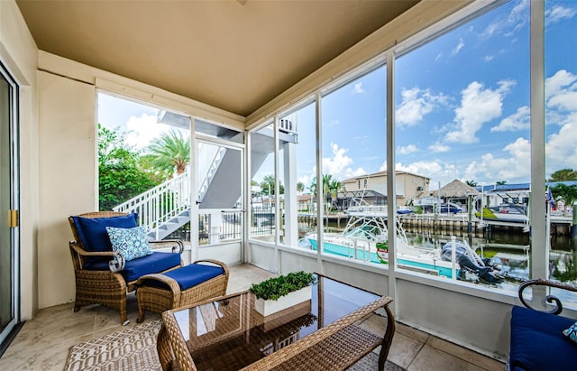 2186 Edythe Dr Unit 11, Dunedin, FL 34698 - sunroom / solarium featuring a water view