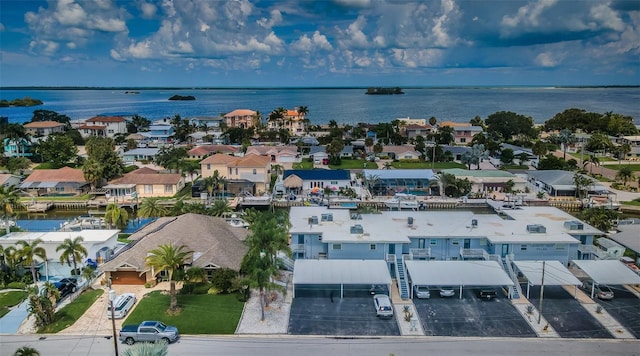 2186 Edythe Dr Unit 11, Dunedin, FL 34698 - aerial perspective of suburban area with a nearby body of water