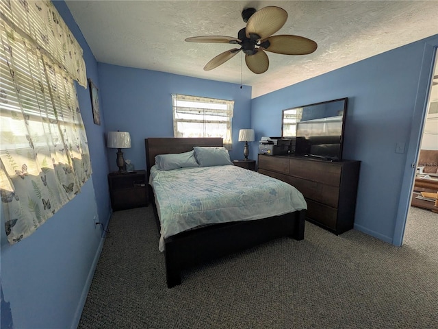 5930 Bahama Way N, St Pete Beach, FL 33706 - bedroom featuring carpet flooring, baseboards, a ceiling fan, and a textured ceiling