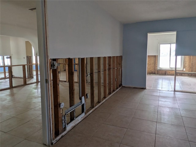 5930 Bahama Way N, St Pete Beach, FL 33706 - unfurnished room featuring arched walkways and tile patterned flooring