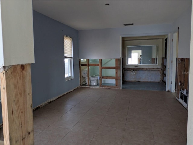 5930 Bahama Way N, St Pete Beach, FL 33706 - empty room with tile patterned floors