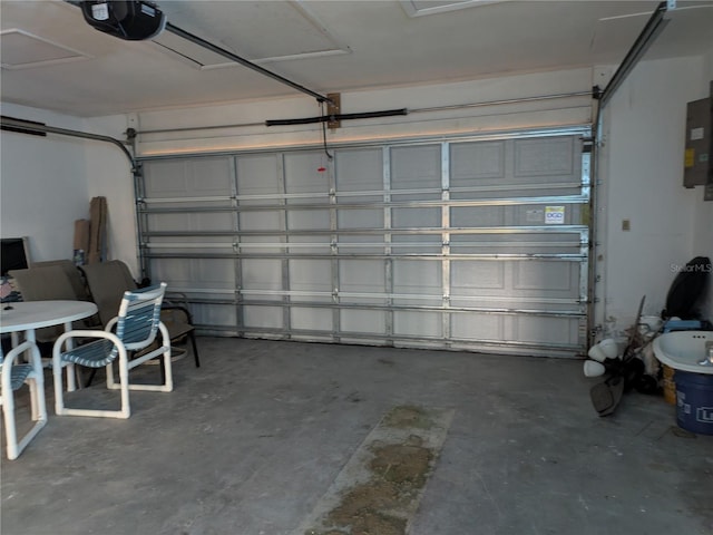 5930 Bahama Way N, St Pete Beach, FL 33706 - garage featuring a garage door opener