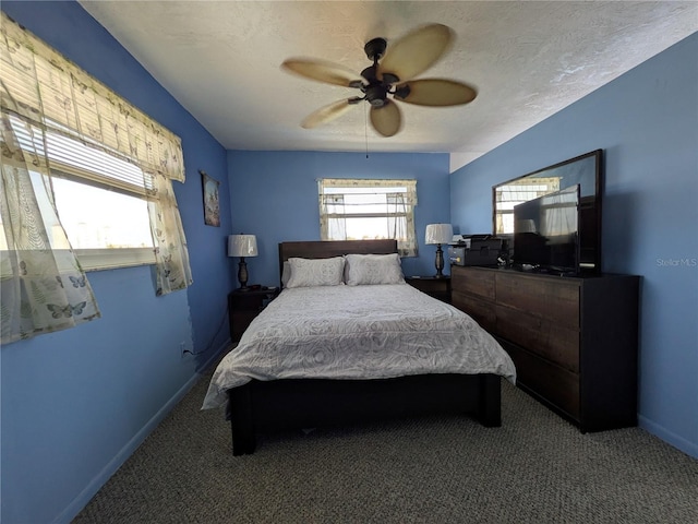 5930 Bahama Way N, St Pete Beach, FL 33706 - bedroom with carpet floors, baseboards, and ceiling fan