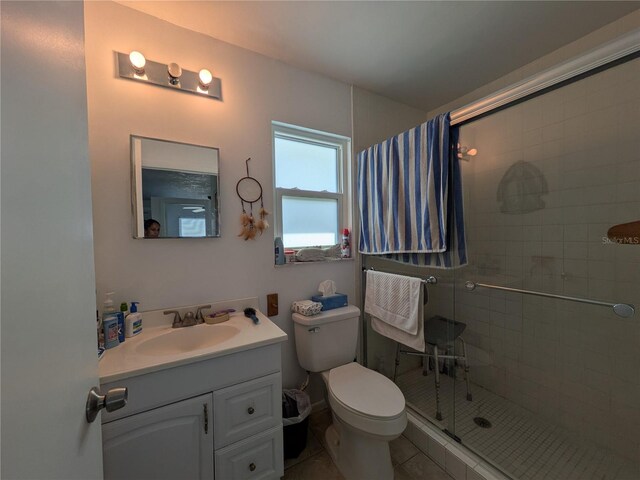 5930 Bahama Way N, St Pete Beach, FL 33706 - full bathroom with a shower stall, vanity, toilet, and tile patterned floors