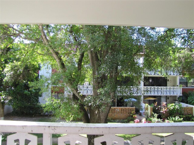 view of yard featuring a balcony