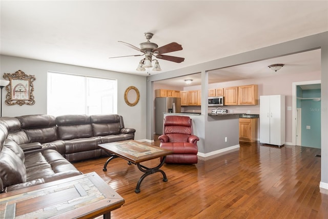 1310 Hilton Pl, Tampa, FL 33604 - living room with ceiling fan, baseboards, and wood finished floors