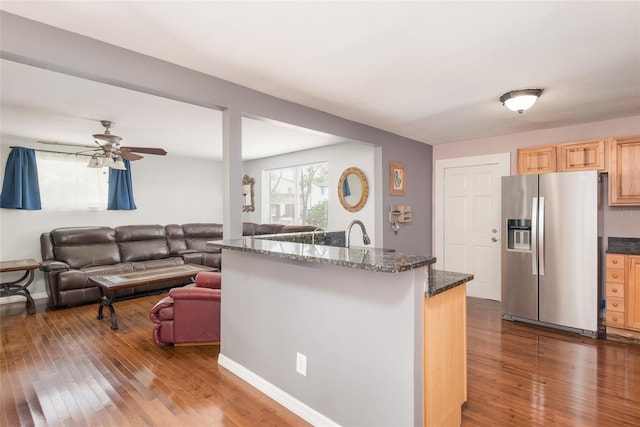 1310 Hilton Pl, Tampa, FL 33604 - kitchen featuring a ceiling fan, light brown cabinetry, stainless steel fridge with ice dispenser, open floor plan, and dark wood-style floors
