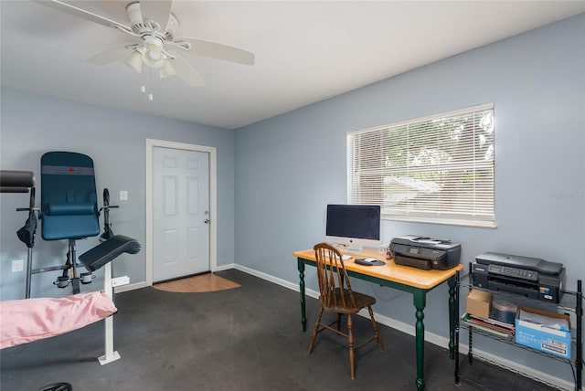 1310 Hilton Pl, Tampa, FL 33604 - office space with baseboards, a ceiling fan, and dark carpet
