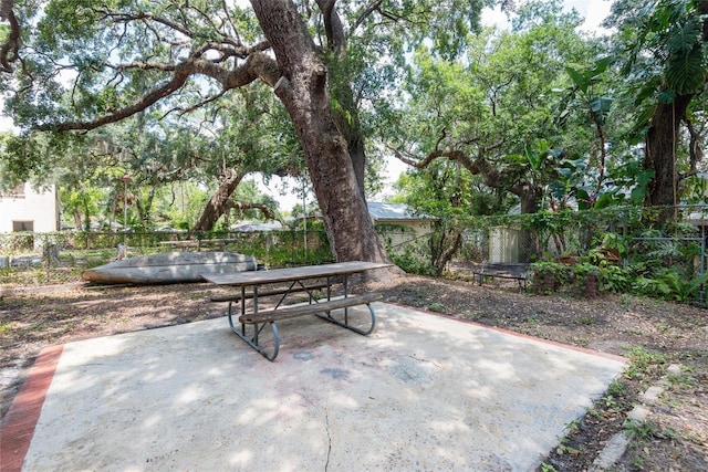 1310 Hilton Pl, Tampa, FL 33604 - view of patio featuring fence and outdoor dining space