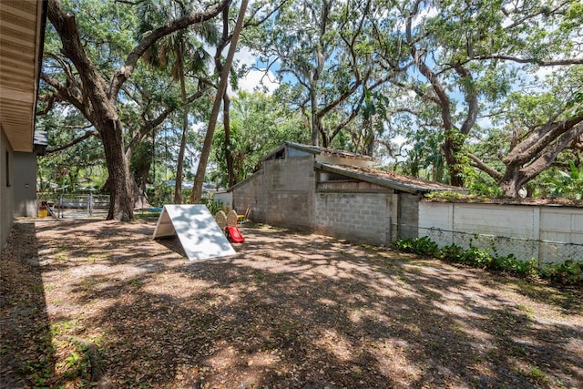 1310 Hilton Pl, Tampa, FL 33604 - view of storm shelter with fence