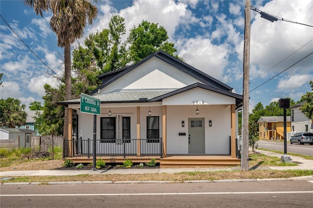 2718 N 21st St, Tampa, FL 33605 - view of front of property featuring a porch and stucco siding