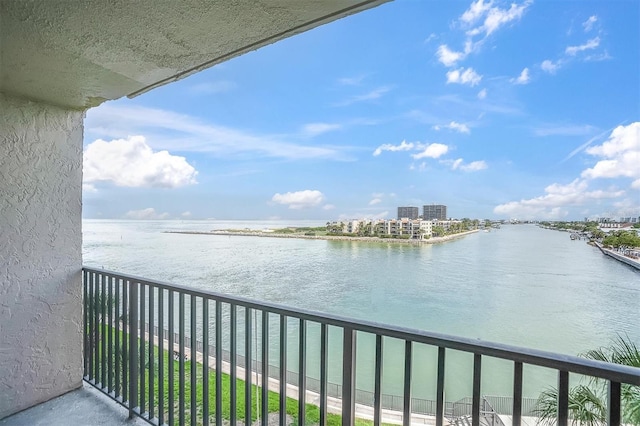 balcony featuring a water view