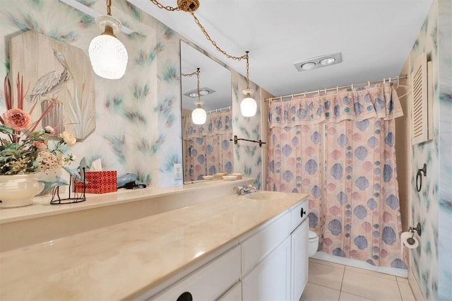 bathroom with tile patterned flooring, a shower with shower curtain, wallpapered walls, and vanity