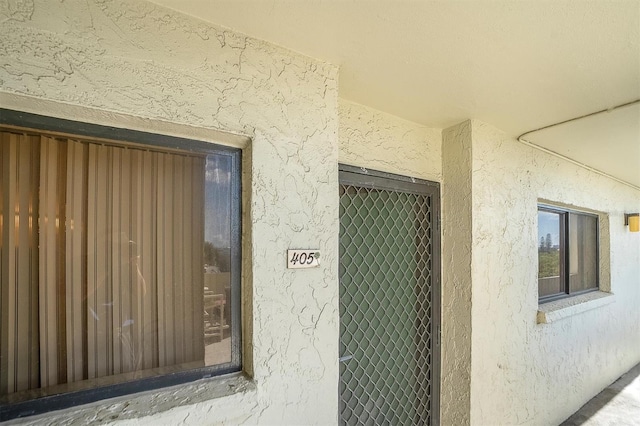 exterior space featuring stucco siding