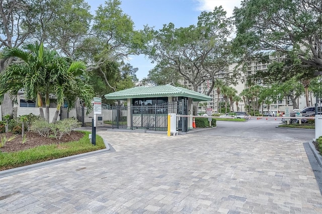 surrounding community with a gate and fence