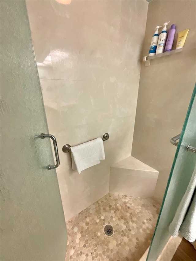 4740 Carrington Ct Unit 4740, New Port Richey, FL 34655 - bathroom featuring a stall shower