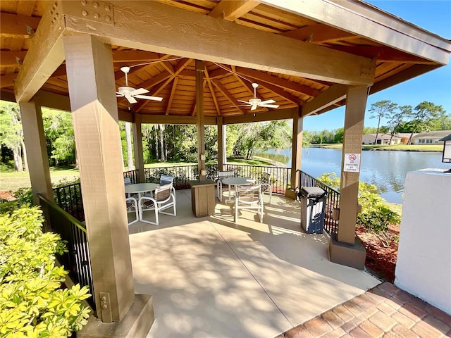 4740 Carrington Ct Unit 4740, New Port Richey, FL 34655 - view of patio featuring a gazebo, a ceiling fan, and a water view