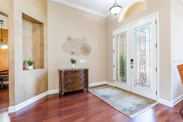 3300 Stonegate Falls Dr, Land O Lakes, FL 34638 - entrance foyer featuring wood finished floors, ornamental molding, and baseboards