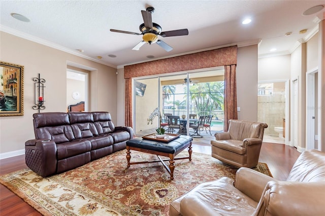 3300 Stonegate Falls Dr, Land O Lakes, FL 34638 - living room with a ceiling fan, wood finished floors, crown molding, baseboards, and recessed lighting