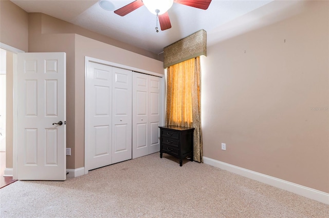 3300 Stonegate Falls Dr, Land O Lakes, FL 34638 - unfurnished bedroom featuring carpet, a closet, baseboards, and ceiling fan
