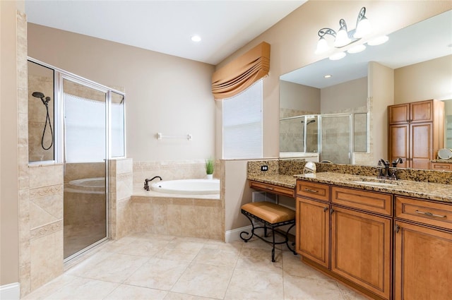 3300 Stonegate Falls Dr, Land O Lakes, FL 34638 - bathroom featuring tile patterned flooring, plenty of natural light, a shower stall, and a bath