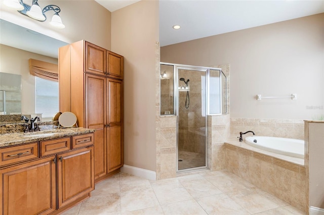 3300 Stonegate Falls Dr, Land O Lakes, FL 34638 - full bath with a shower stall, a bath, tile patterned floors, and vanity
