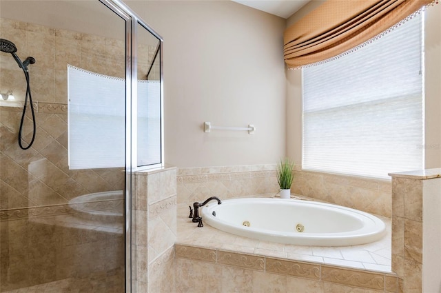 3300 Stonegate Falls Dr, Land O Lakes, FL 34638 - bathroom with a shower stall and a tub with jets