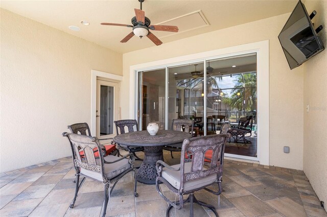 3300 Stonegate Falls Dr, Land O Lakes, FL 34638 - view of patio / terrace with a ceiling fan and outdoor dining space