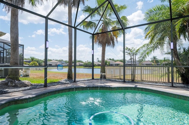 3300 Stonegate Falls Dr, Land O Lakes, FL 34638 - view of swimming pool with a lanai and a water view