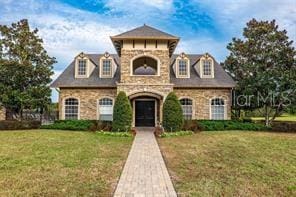 3300 Stonegate Falls Dr, Land O Lakes, FL 34638 - view of front of property with a front lawn