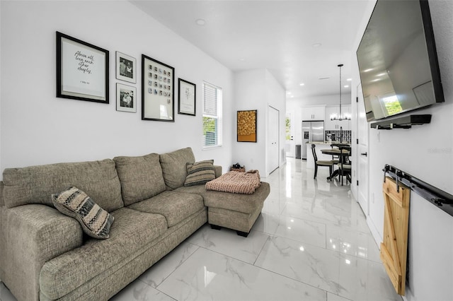 living room featuring light marble finish flooring and recessed lighting