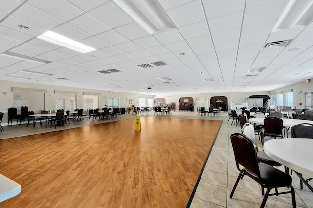 11723 Boynton Ln Unit 1, New Port Richey, FL 34654 - miscellaneous room featuring a drop ceiling and light wood finished floors